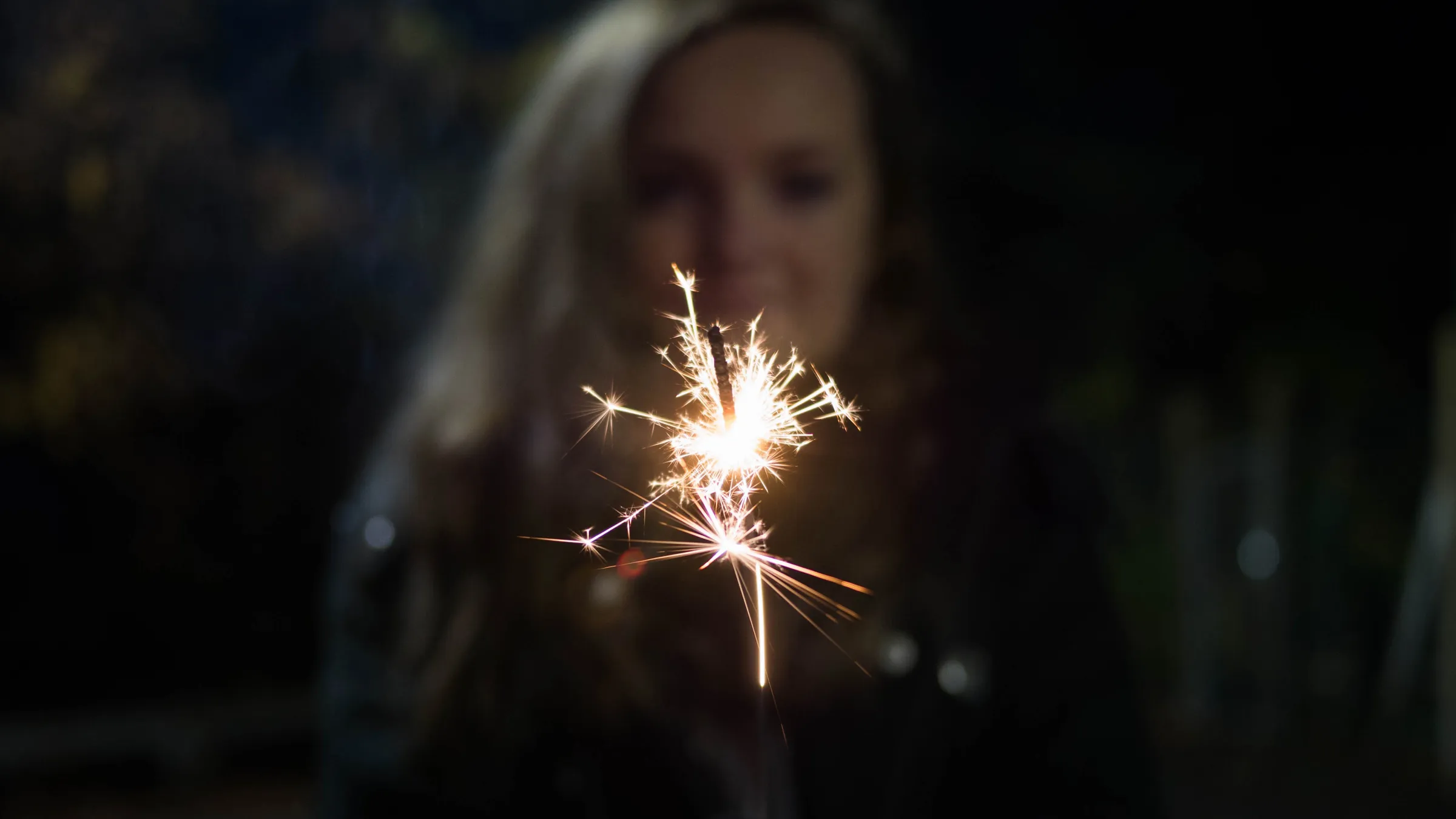 Woman holding a sparkler